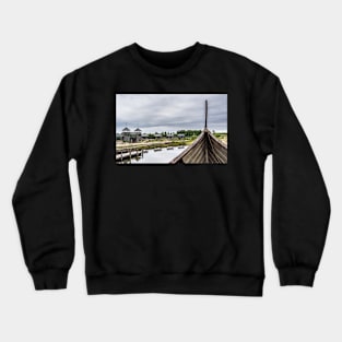 Bow of a wooden boat in a cloudy day Crewneck Sweatshirt